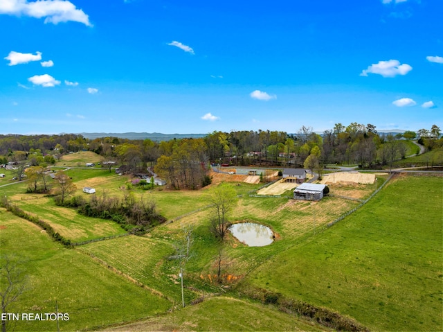 birds eye view of property featuring a rural view