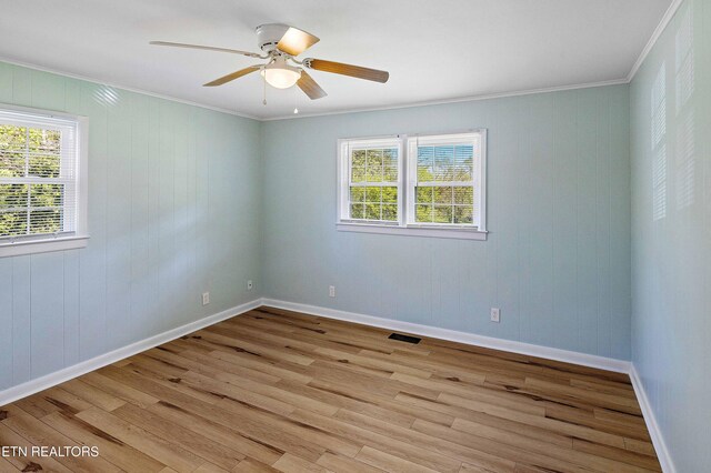 201 Farlow Dr, Knoxville, TN 37934 - spare room with light wood-style flooring, baseboards, crown molding, and ceiling fan