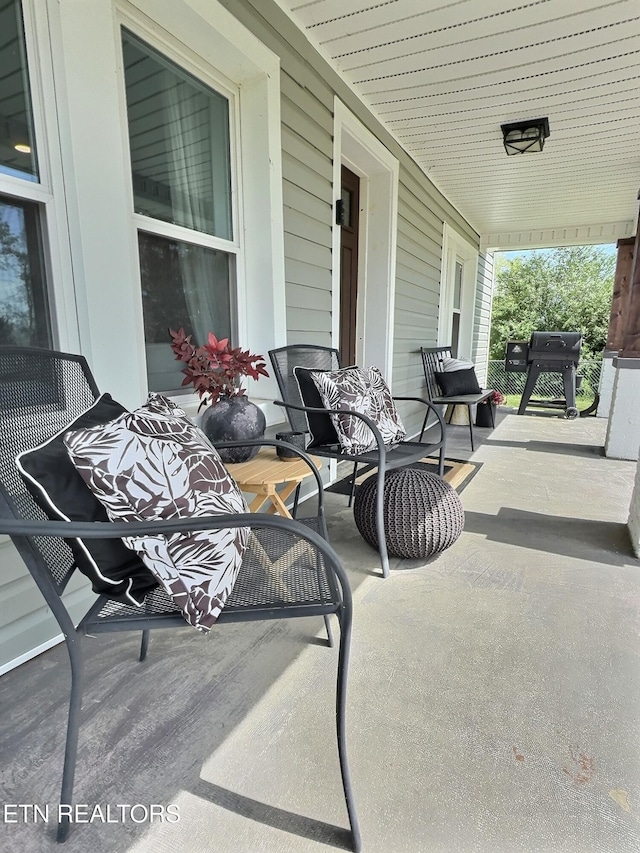 view of patio featuring covered porch and grilling area