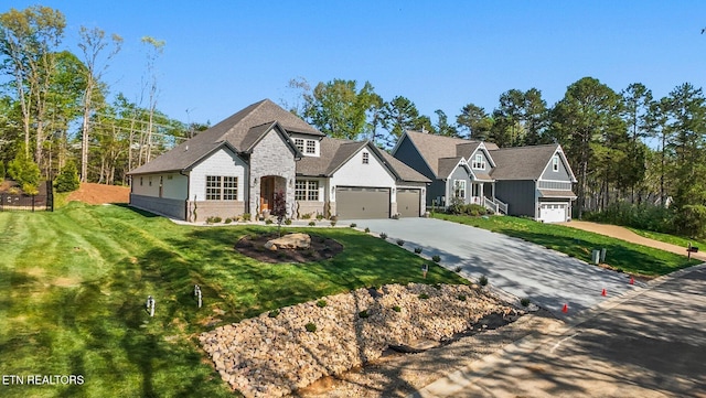 204 Atoka Pl, Loudon, TN 37774 - view of front of home featuring a garage, driveway, and a front lawn