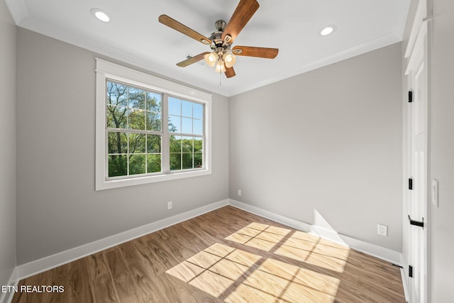 204 Atoka Pl, Loudon, TN 37774 - unfurnished room with crown molding, wood finished floors, and ceiling fan
