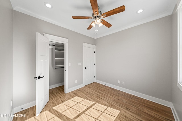 204 Atoka Pl, Loudon, TN 37774 - unfurnished bedroom featuring recessed lighting, baseboards, ornamental molding, and wood finished floors