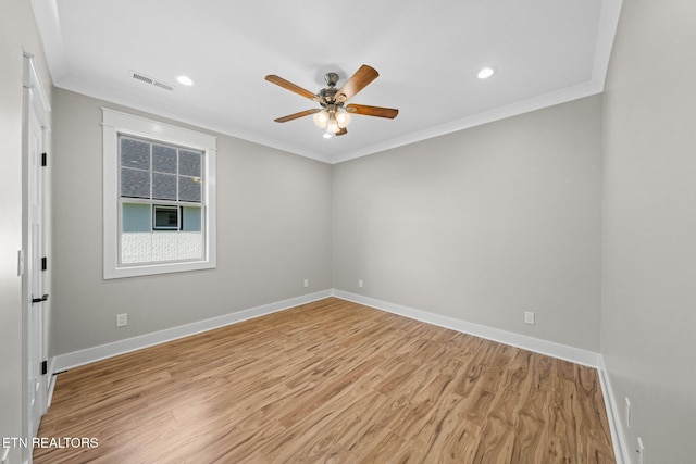 204 Atoka Pl, Loudon, TN 37774 - spare room featuring crown molding, ceiling fan, visible vents, light wood finished floors, and baseboards