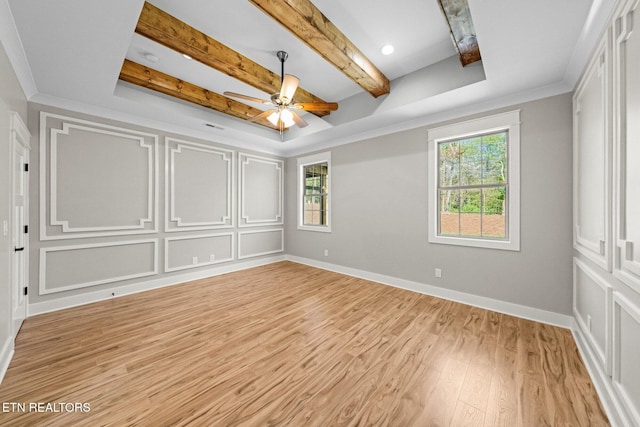204 Atoka Pl, Loudon, TN 37774 - unfurnished bedroom featuring light wood-style floors, a decorative wall, multiple windows, and beam ceiling