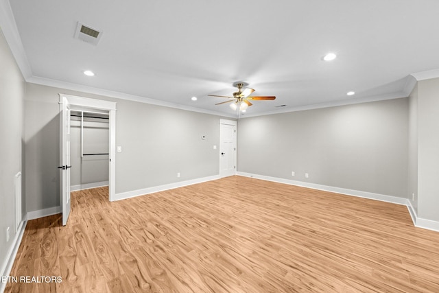 204 Atoka Pl, Loudon, TN 37774 - unfurnished room featuring visible vents, baseboards, a ceiling fan, crown molding, and light wood finished floors
