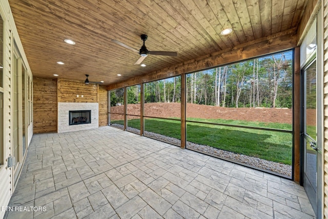 204 Atoka Pl, Loudon, TN 37774 - unfurnished sunroom with ceiling fan and a fireplace