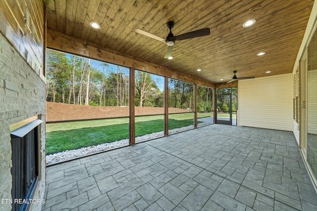 204 Atoka Pl, Loudon, TN 37774 - unfurnished sunroom featuring a large fireplace and a ceiling fan