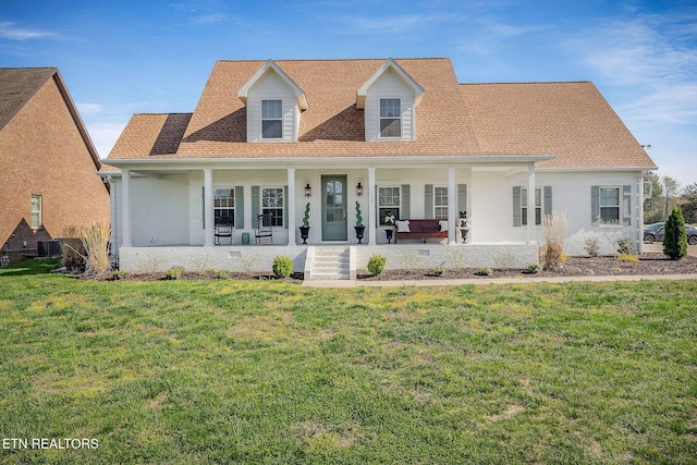 1798 Pearl Ave, Cookeville, TN 38506 - cape cod home with cooling unit, a porch, and a front yard