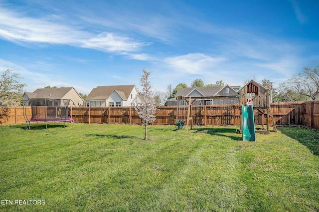 1798 Pearl Ave, Cookeville, TN 38506 - view of yard featuring a residential view, a trampoline, a playground, and a fenced backyard