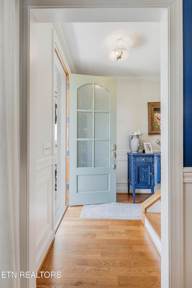 1798 Pearl Ave, Cookeville, TN 38506 - entryway featuring crown molding, wood finished floors, and a decorative wall