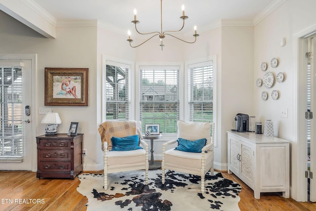 1798 Pearl Ave, Cookeville, TN 38506 - sitting room featuring baseboards, crown molding, light wood-style flooring, and an inviting chandelier