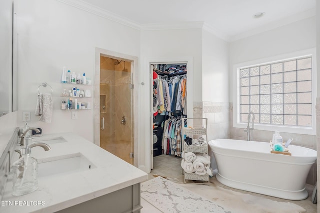 1798 Pearl Ave, Cookeville, TN 38506 - full bathroom with a stall shower, crown molding, a spacious closet, a freestanding bath, and tile walls