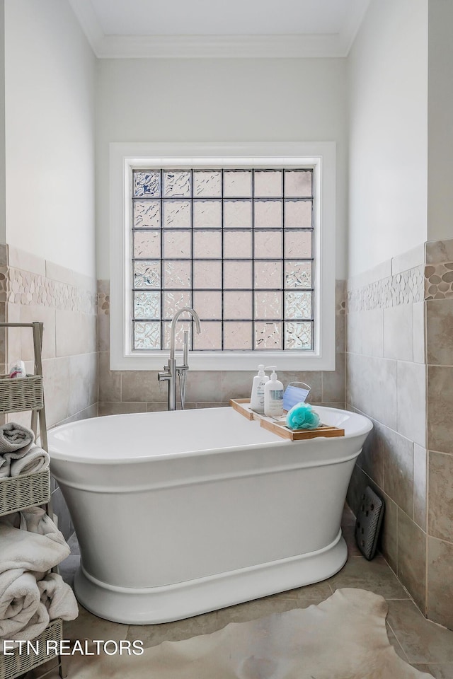 1798 Pearl Ave, Cookeville, TN 38506 - bathroom featuring a soaking tub, a wealth of natural light, ornamental molding, and tile walls
