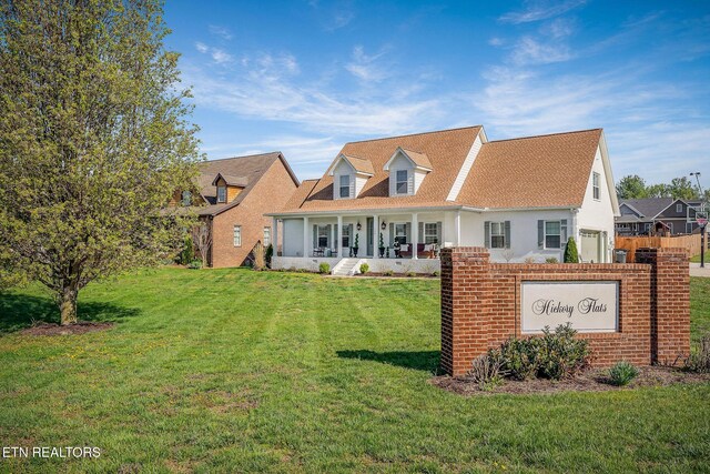 1798 Pearl Ave, Cookeville, TN 38506 - rear view of property featuring covered porch, stucco siding, and a yard