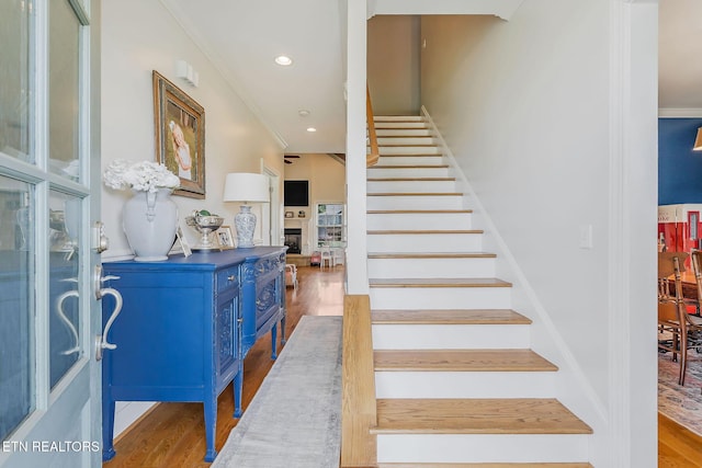 1798 Pearl Ave, Cookeville, TN 38506 - staircase with recessed lighting, ornamental molding, a fireplace, and wood finished floors