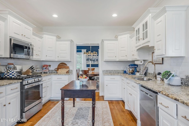 1798 Pearl Ave, Cookeville, TN 38506 - kitchen featuring a sink, white cabinets, and appliances with stainless steel finishes