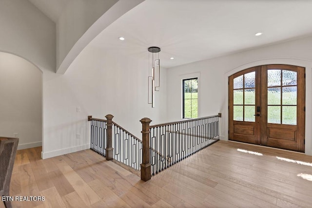 788 Blackberry Ridge Rd, Lenoir City, TN 37772 - entrance foyer featuring french doors, arched walkways, and wood finished floors