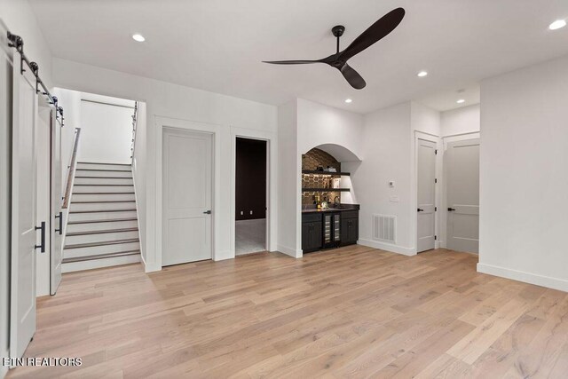 788 Blackberry Ridge Rd, Lenoir City, TN 37772 - interior space with ceiling fan, light wood-type flooring, visible vents, recessed lighting, and a barn door