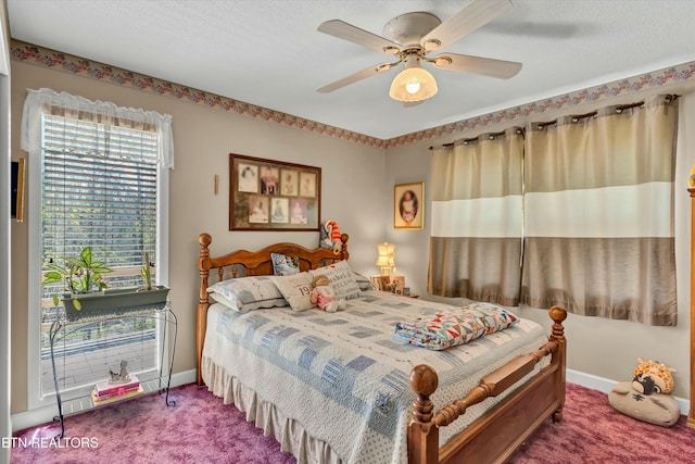 bedroom with ceiling fan, baseboards, and carpet