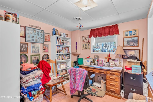 carpeted office with a drop ceiling and visible vents