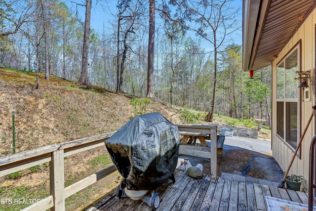 deck featuring a grill