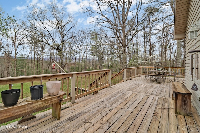 deck featuring outdoor dining space