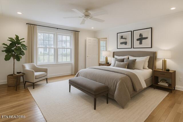 bedroom with baseboards and light wood-style flooring