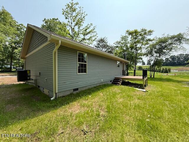 515 Hillcrest St, Clinton, TN 37716 - view of property exterior with crawl space, a yard, cooling unit, and a wooden deck