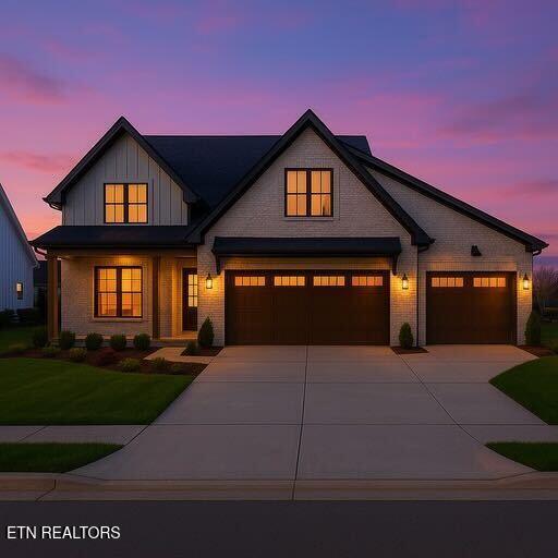 view of front of home with board and batten siding and concrete driveway