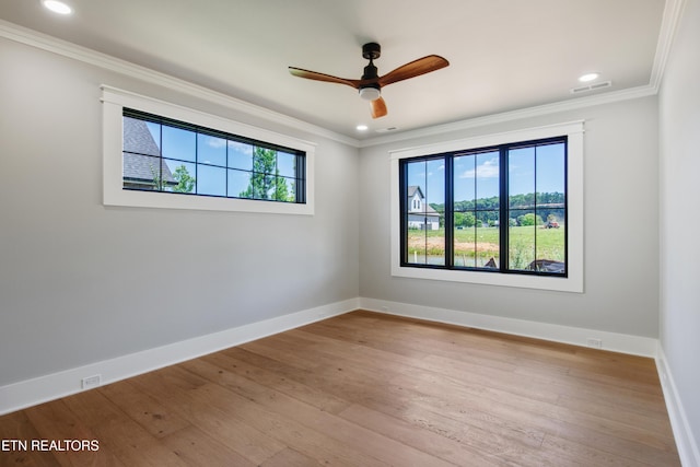 686 Ironwood Ln, Loudon, TN 37774 - empty room with crown molding, ceiling fan, hardwood / wood-style floors, baseboards, and recessed lighting