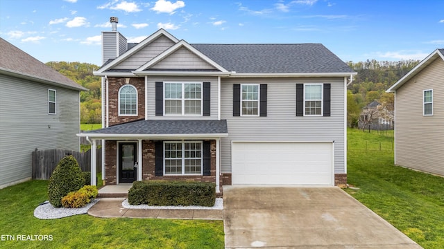 8131 Cambridge Reserve Dr, Knoxville, TN 37924 - traditional home featuring concrete driveway, an attached garage, brick siding, and a shingled roof