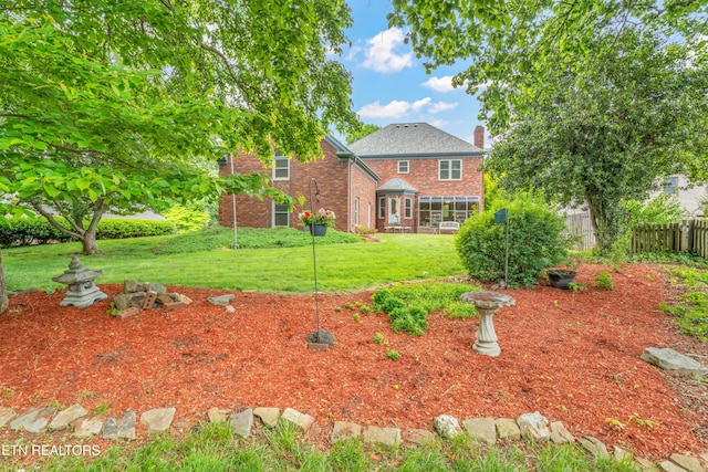 view of yard featuring fence
