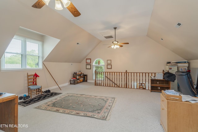 additional living space featuring visible vents, a ceiling fan, carpet floors, and vaulted ceiling