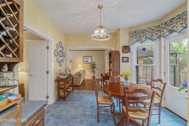 dining room featuring baseboards