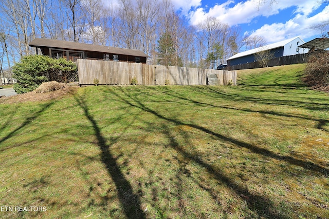 view of yard featuring fence