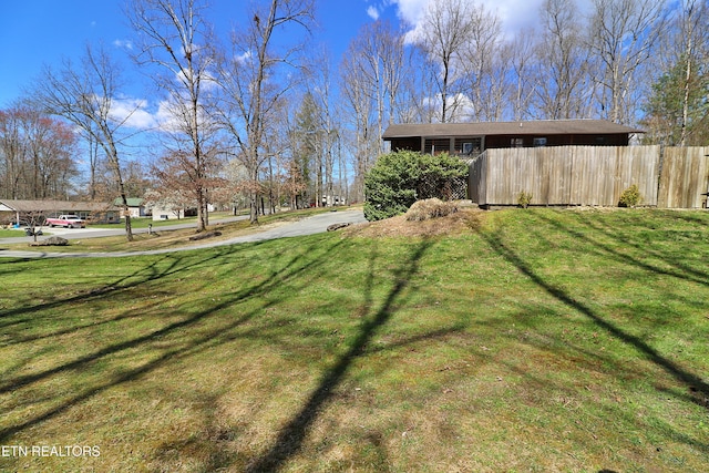 view of yard featuring fence