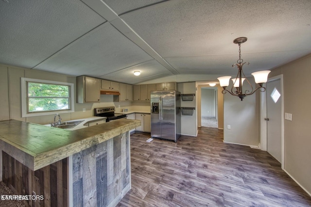 350 Kagley Dr, Lenoir City, TN 37771 - kitchen featuring a sink, a chandelier, dark wood finished floors, stainless steel appliances, and lofted ceiling