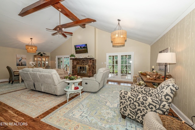 4225 W Lakeview Cir, Louisville, TN 37777 - living area with wood finished floors, a chandelier, ceiling fan, high vaulted ceiling, and a stone fireplace