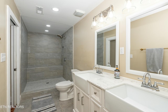 4225 W Lakeview Cir, Louisville, TN 37777 - bathroom with toilet, double vanity, tile patterned flooring, recessed lighting, and tiled shower