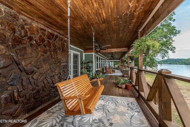 4225 W Lakeview Cir, Louisville, TN 37777 - wooden deck with a ceiling fan and a water view