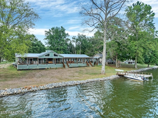 4225 W Lakeview Cir, Louisville, TN 37777 - rear view of house featuring a water view, a yard, and a porch