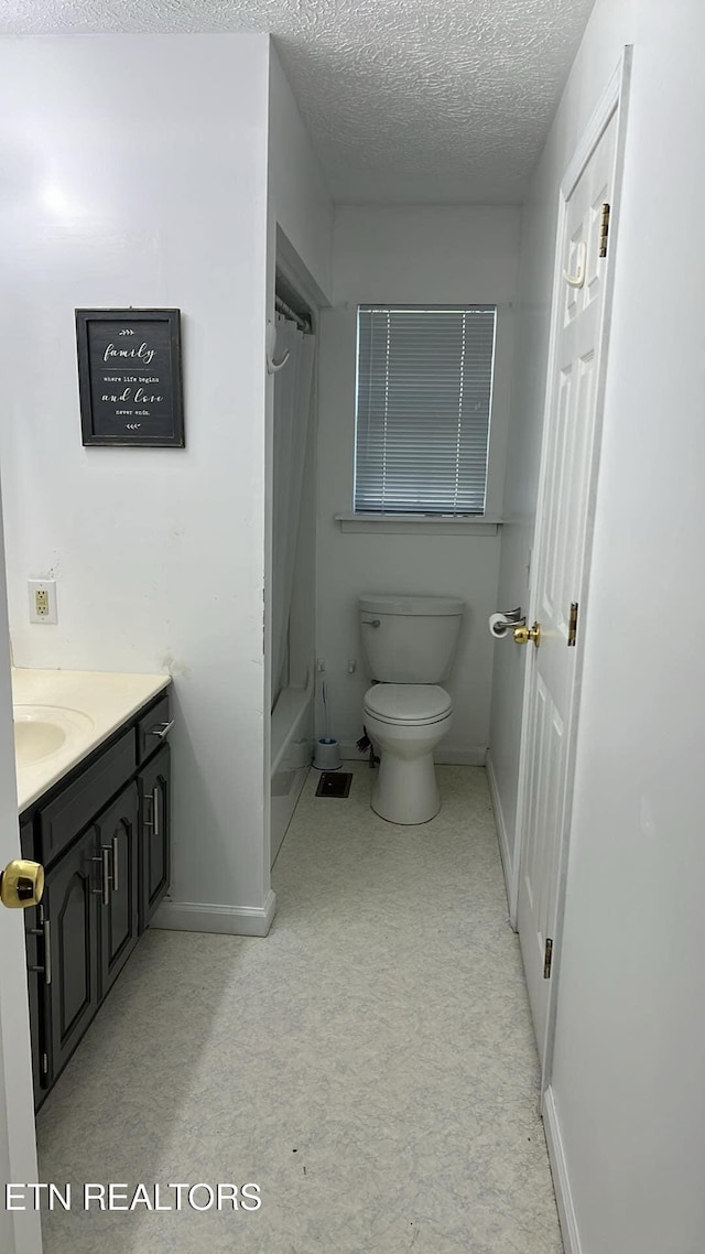 798 Lawson Rd, Crossville, TN 38571 - full bath featuring vanity, a textured ceiling, and shower / tub combo with curtain