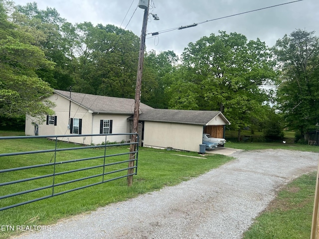 798 Lawson Rd, Crossville, TN 38571 - view of front of property featuring driveway and roof with shingles