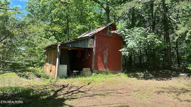 798 Lawson Rd, Crossville, TN 38571 - view of outbuilding with a wooded view