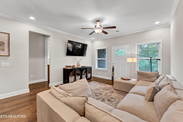 living area with a ceiling fan, crown molding, dark wood-style floors, and recessed lighting