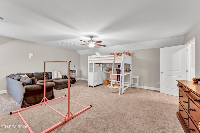 bedroom featuring lofted ceiling, visible vents, carpet floors, baseboards, and ceiling fan