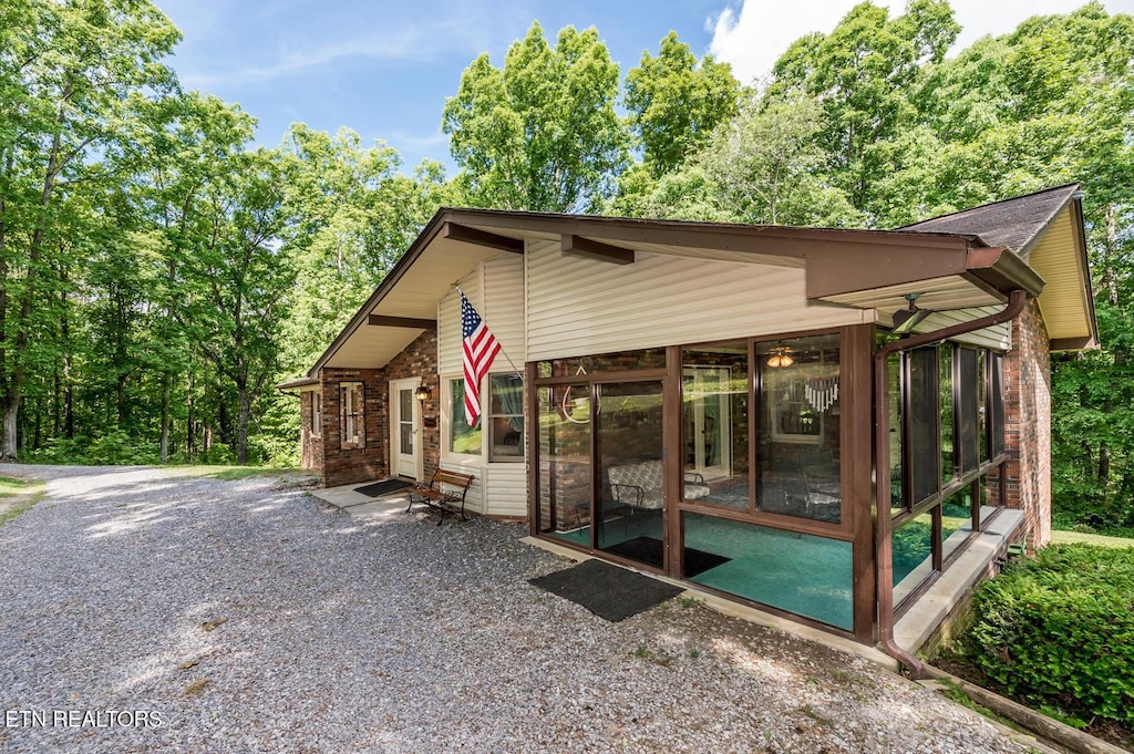 1211 Old Hollow Rd, Loudon, TN 37774 - view of outbuilding featuring a sunroom
