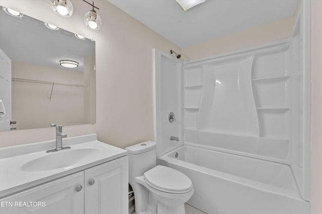 full bath with toilet, vanity, and washtub / shower combination