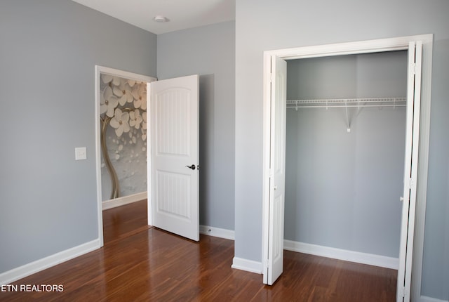129 Mcneilly Cir, Maryville, TN 37803 - unfurnished bedroom with a closet, baseboards, and wood finished floors