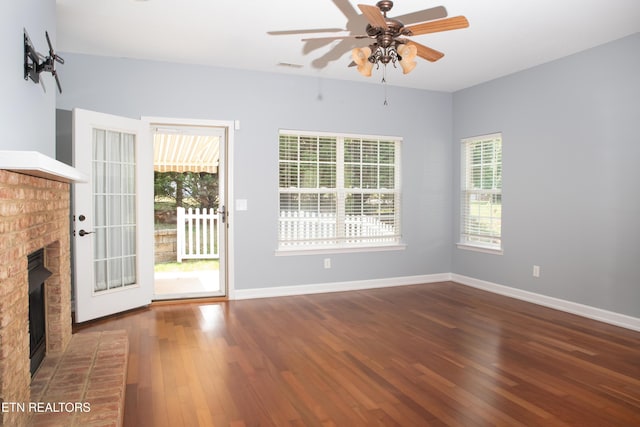 129 Mcneilly Cir, Maryville, TN 37803 - unfurnished living room featuring baseboards, a ceiling fan, wood finished floors, and a fireplace